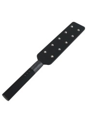 Détail du manche antidérapant et du bouton ON/OFF d’électrostimulation